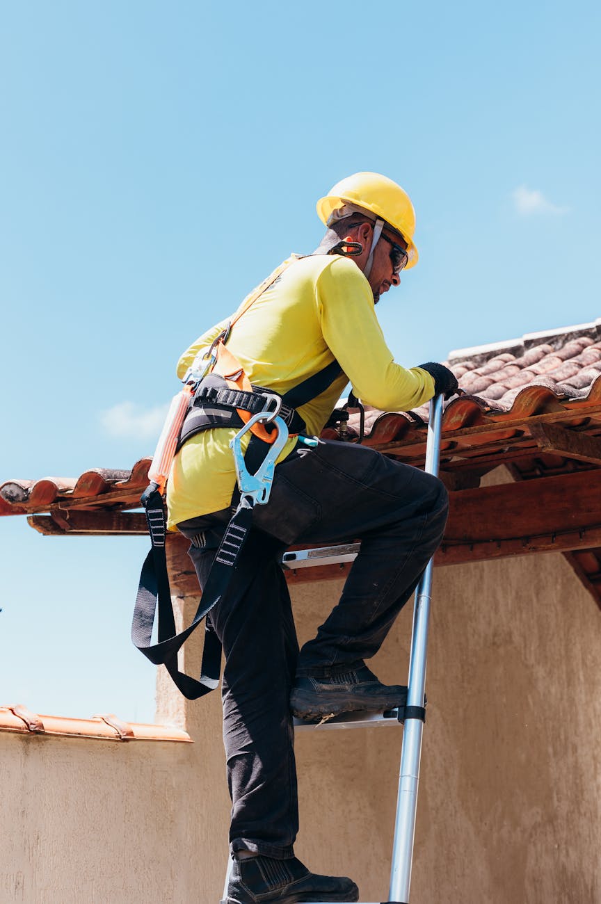 Roofing contractor repairing storm damage in Pasadena, MD.