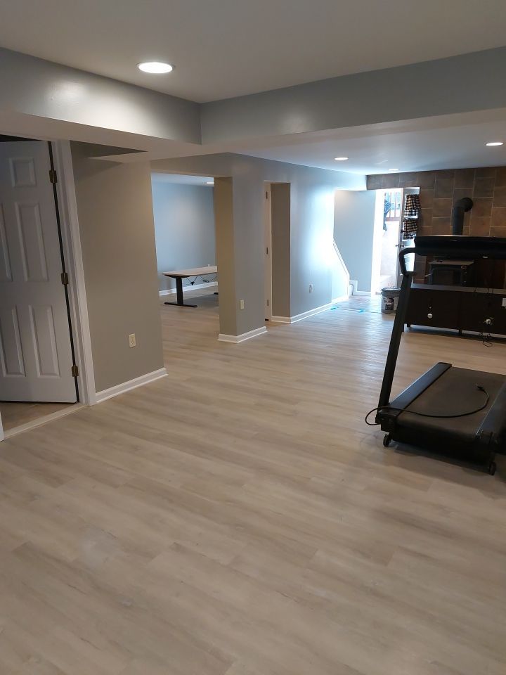 Finished basement with treadmill and open space